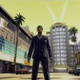 Tony Montana stands in the middle of a Las Vegas street during the day.